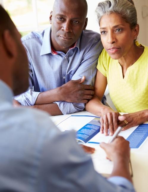 couple talking to agent