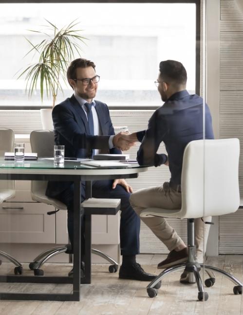 men talking in an office