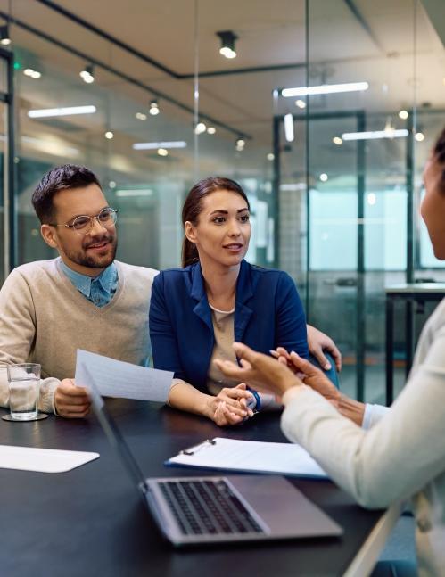 Financial Advisor talking to couple