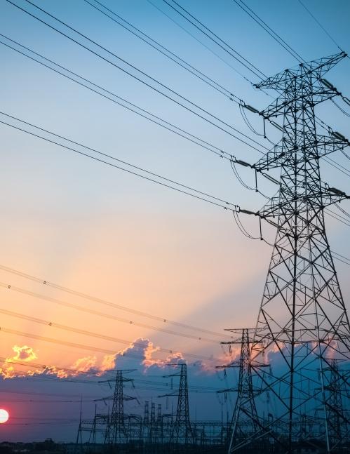 A power pole at sundown