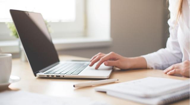 working at laptop