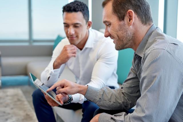 men meeting about a car lease ending