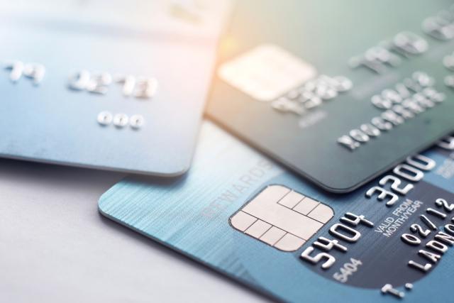 credit cards laying on a table