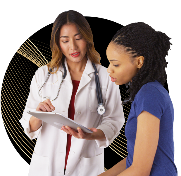 Doctor reading whats on a tablet to a nurse