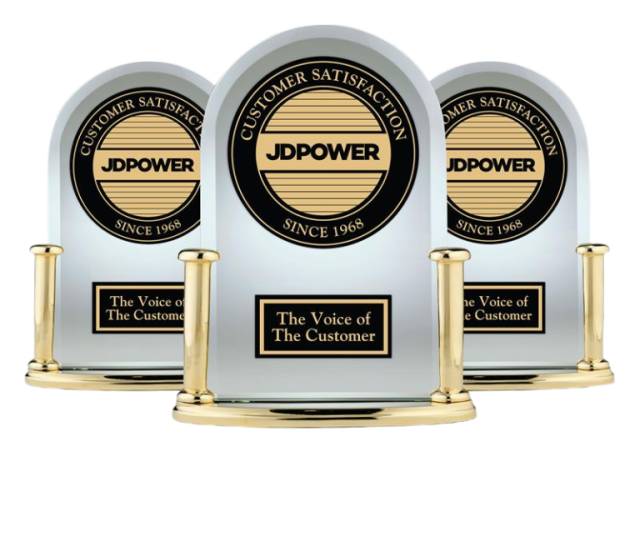 Three JD Power customer satisfaction trophies with gold bases and plaques reading “The Voice of the Customer,” arranged in a row against a white background.