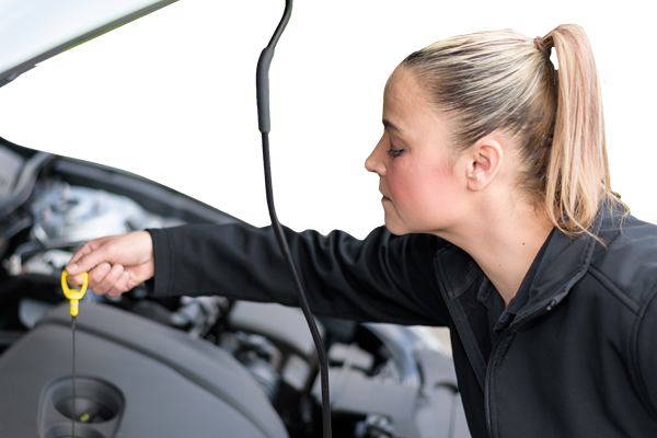 Vehicle undergoing quick oil change and tire service, reflecting key satisfaction drivers such as service speed and perceived fairness measured in the J.D. Power U.S. Aftermarket Service Index (ASI) Study