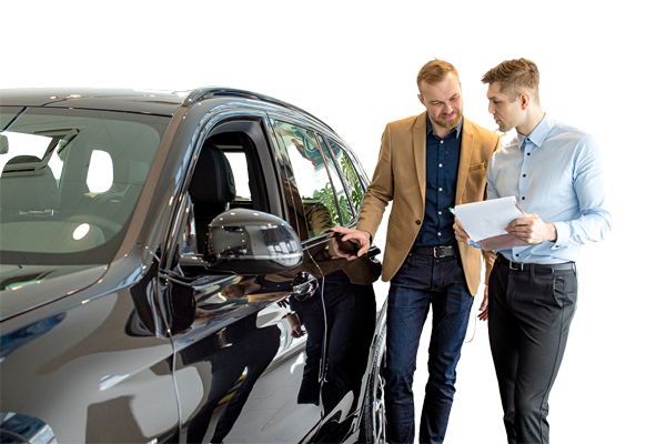 Customer speaking with a dealership service advisor at a service desk, representing satisfaction drivers and communication quality measured in the J.D. Power U.S. Customer Service Index (CSI) Study
