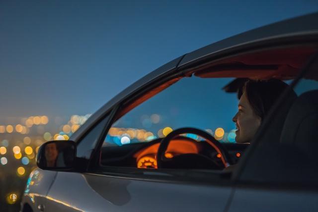 Woman sitting in her automobile