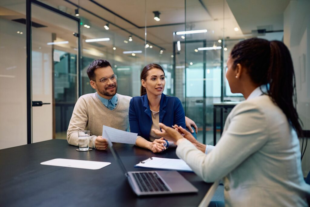 Financial Advisor talking to couple