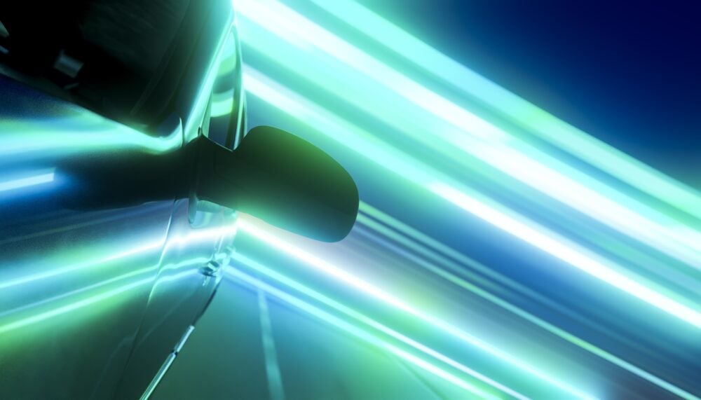 SUV in motion with light trails and futuristic urban technology