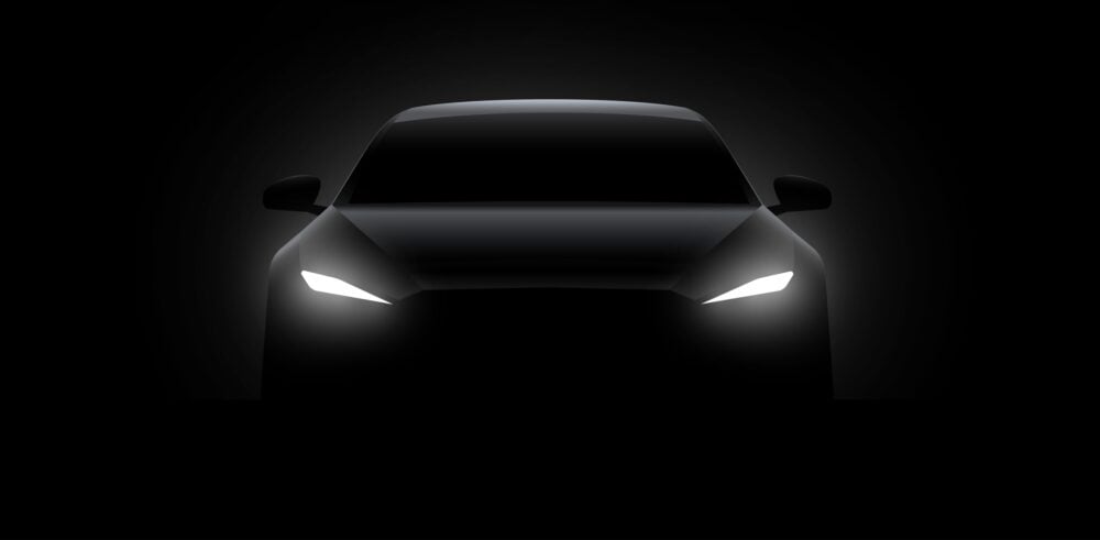 Front car silhouette with rear white lights on dark black background