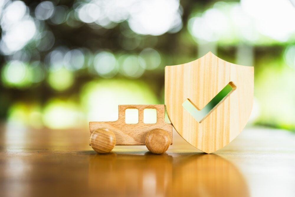Wooden car with protective shield o protect from accident and damage