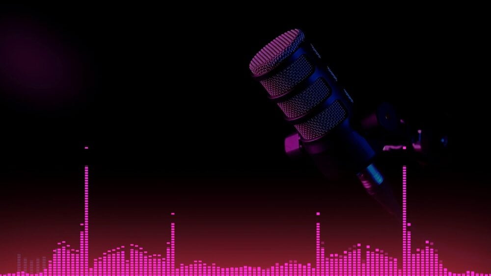 Studio microphone with neon sound wave on dark background